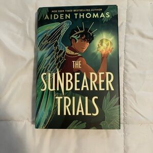 The Sunbearer Trials book by Aiden Thomas